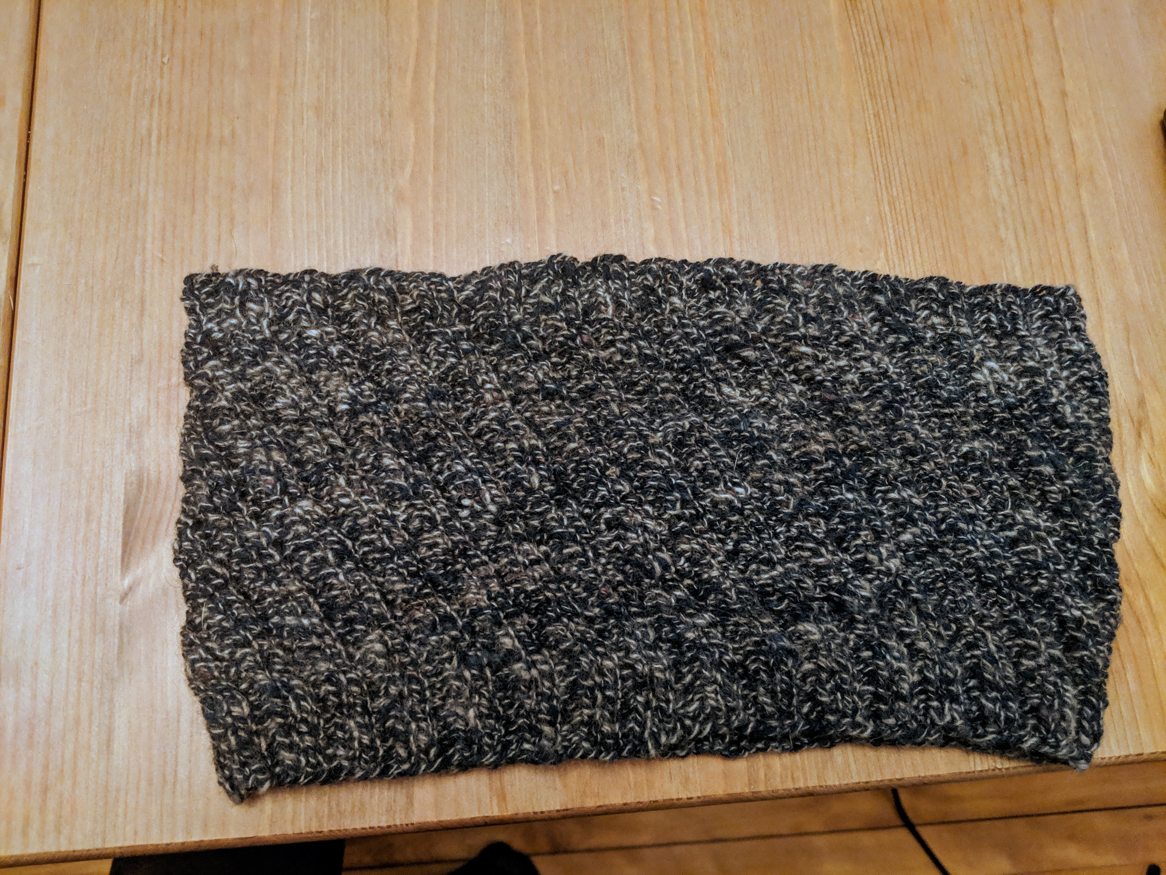 A picture of a diagonal rib cowl on a table.
